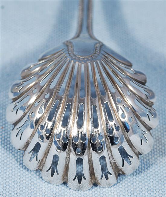 A Victorian silver swing handled sugar basket and sifter spoon, by Martin, Hall & Co, basket height 190mm, weight 7.7oz/241grms.